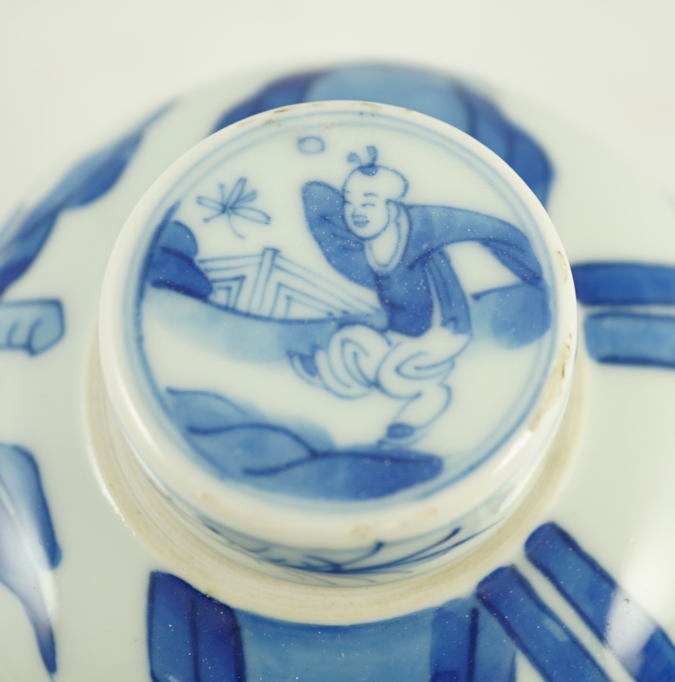A Chinese blue and white jar and cover, probably Kangxi period, 15 cms high, 14.8cm high, small glaze losses to cover